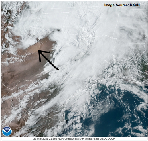 A satellite image showing an area of blowing dust near Lubbock TX. There is cloud cover over much of the region, but clear skies where the dust Is being generated. The land is mostly brown, since it is in a desert region, with the dust cloud a lighter shade of brown.